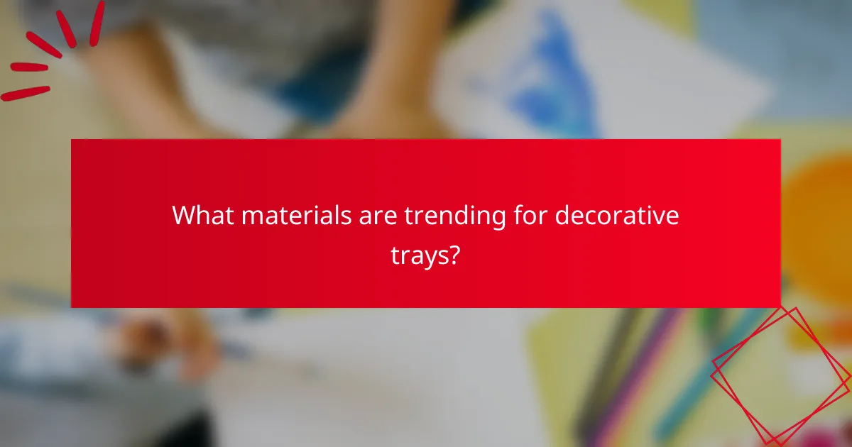 What materials are trending for decorative trays?